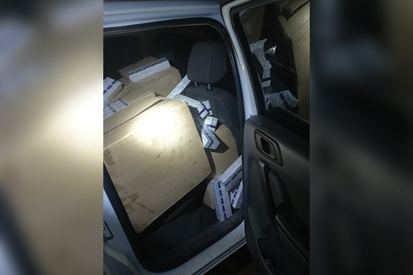 Enforcing a law that many people don't believe in
Police seize 50 boxes of illicit cigarettes