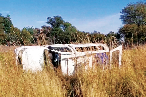 Bakkie and school bus collide