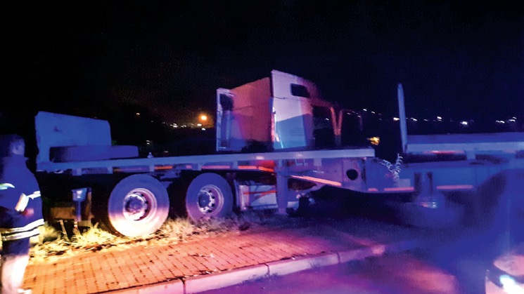The flatbed truck involved in the collision with two pedestrians opposite Thaba Trans on the R510.