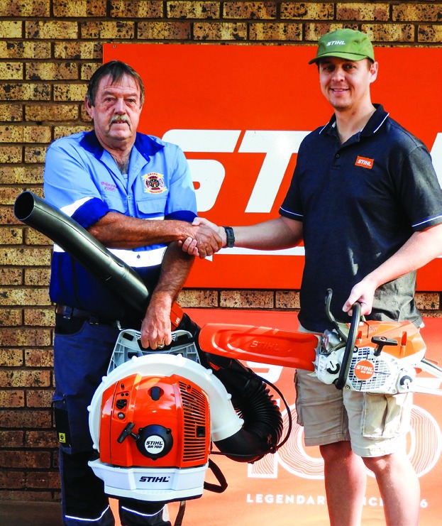 Thaba Fire and Rescue CEO Pierre Loots (left) received the sponsored chainsaw and blower from Wes Enterprises financial manager Johan Nel.