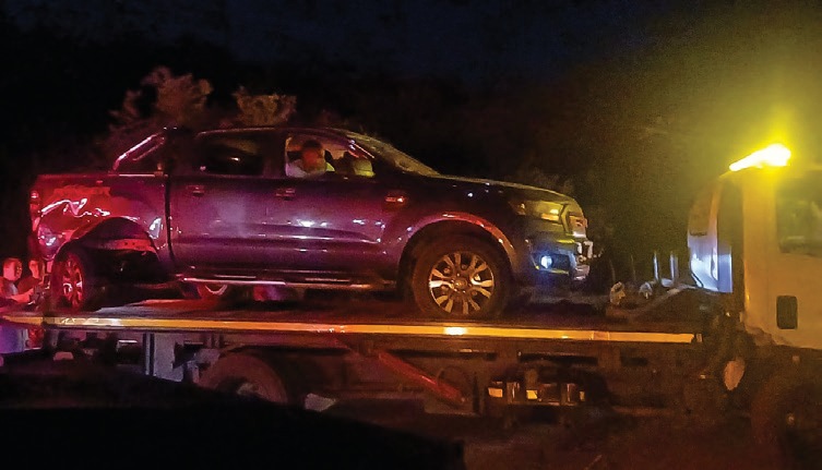One of the vehicles involved in the collision beneath the railway bridge on Warmbad Weg Road was loaded onto a low-bed recovery truck.